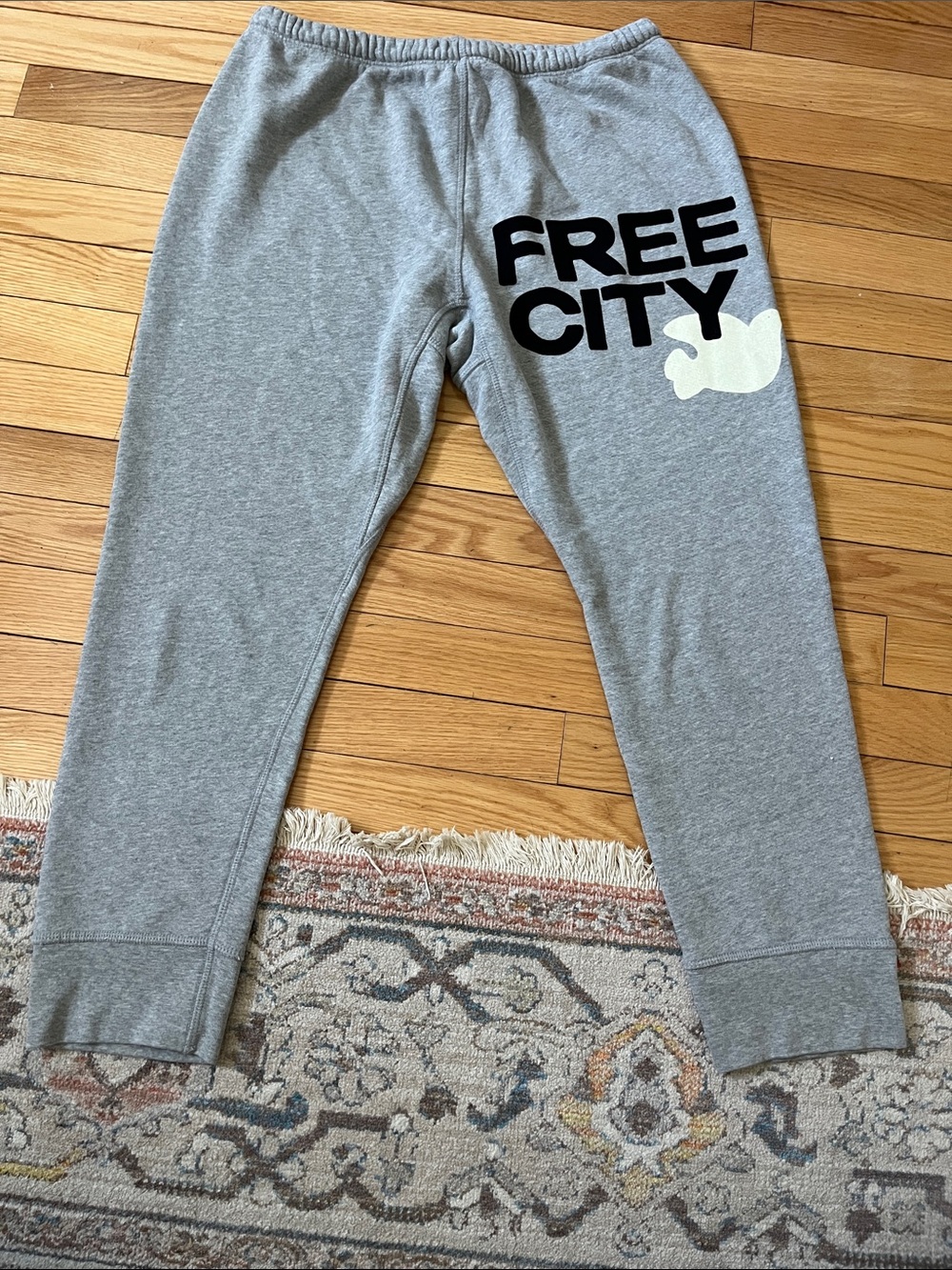 freecity Gray Sweatpants with Black Logo and Cream Graphic